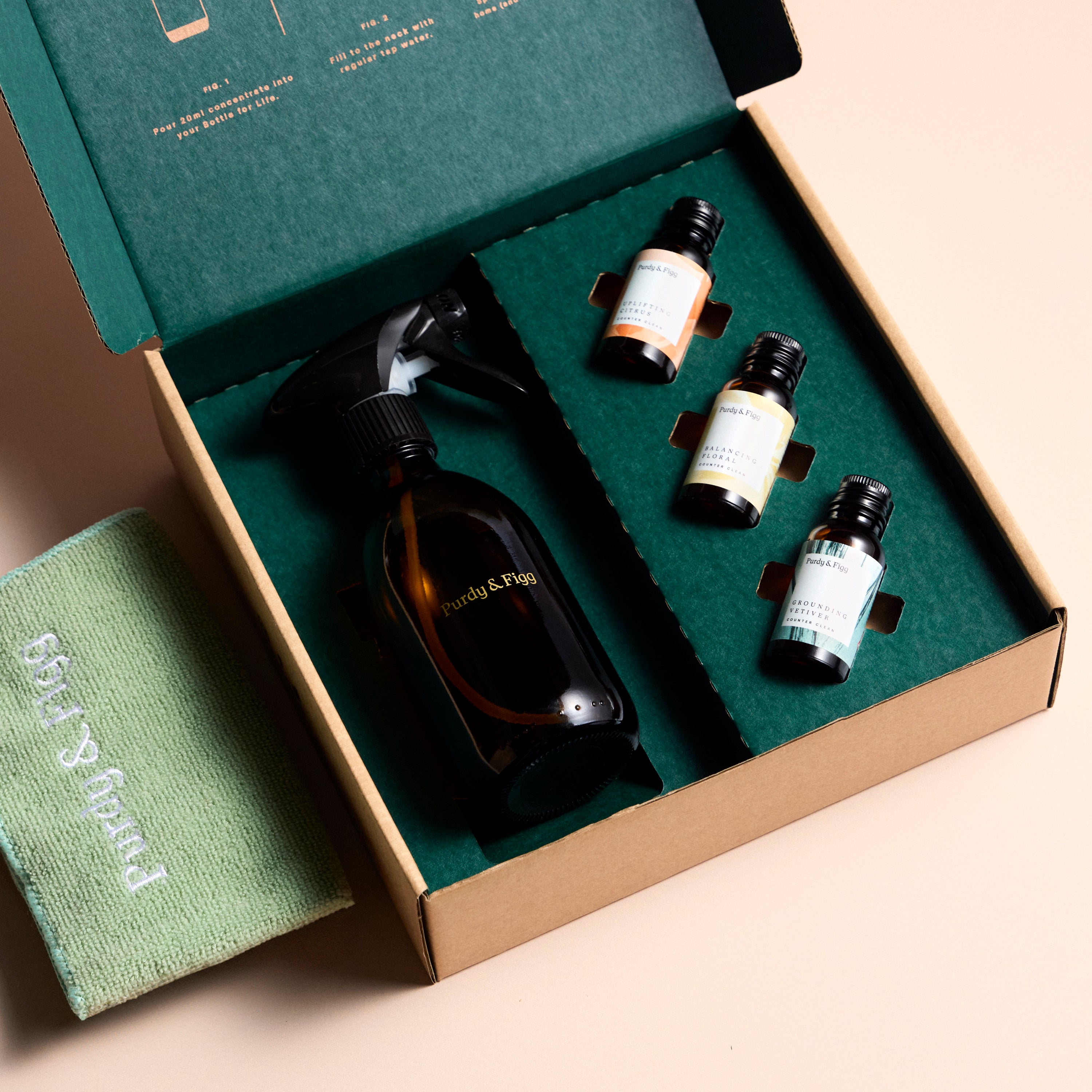 A Bottle for Life and 3 concentrates in a beautiful green-lined cardboard box, with a cloth